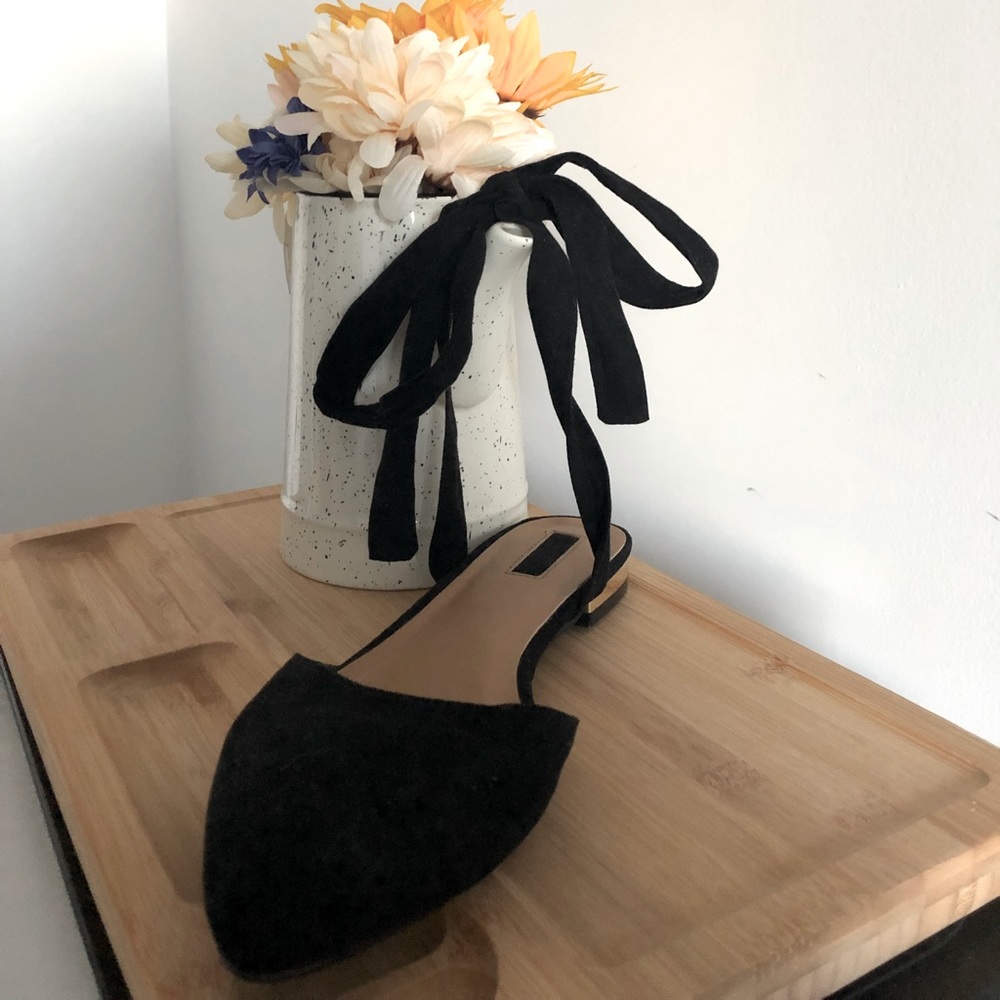 Black flats with tie up strings